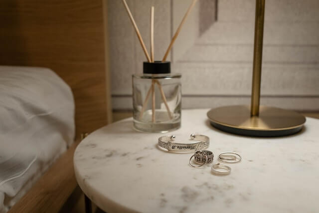 rings and bracelet on a table
